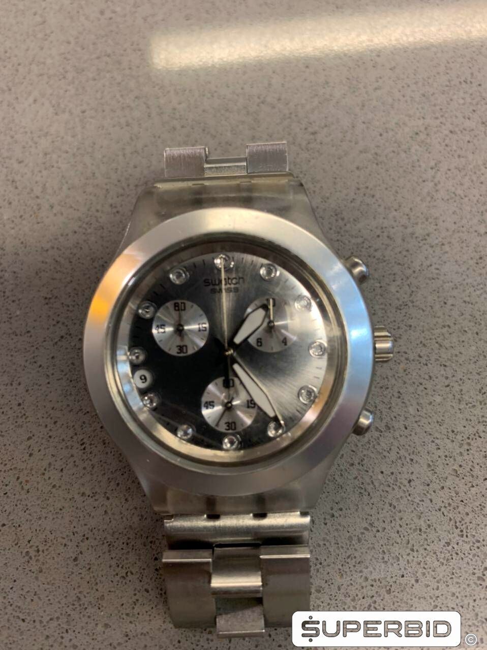 relogio swatch prateado