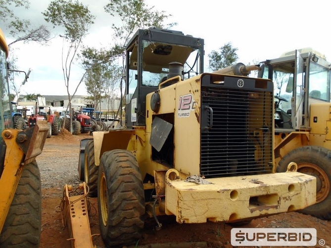 PÁ CARREGADEIRA NEW HOLLAND 12C 4x4, ANO: 2011, CAP: CAÇAMBA: 1M3., SÉRIE: 8364 (Ref: SBK / TP32725)